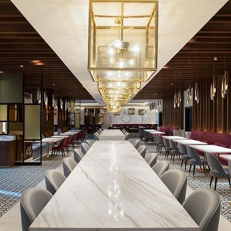 Dusit Doha Hotel Esterno foto The interior of the lounge