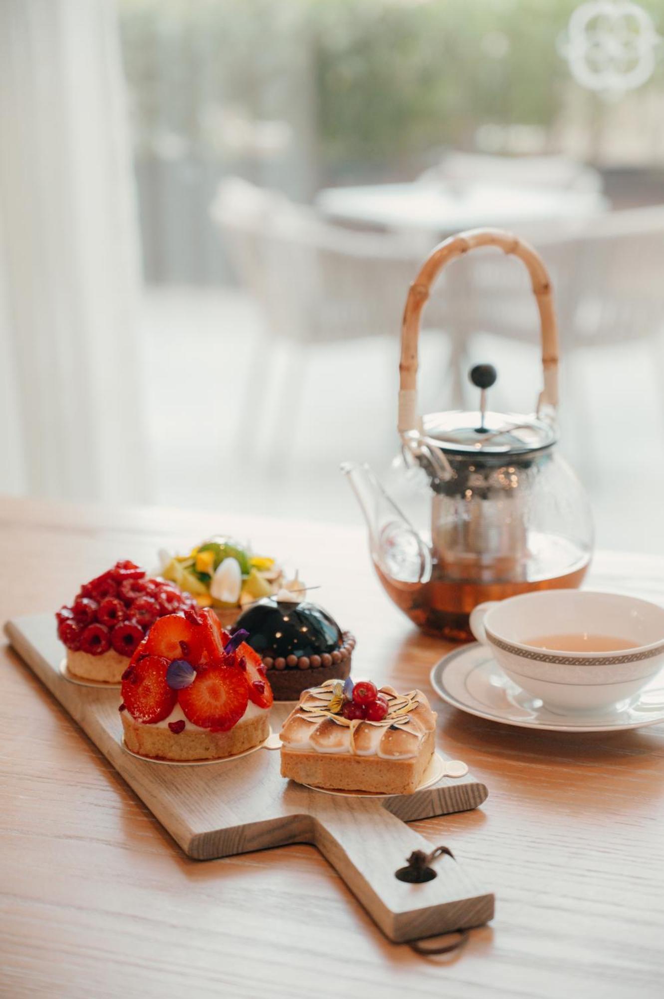 Dusit Doha Hotel Esterno foto Afternoon tea