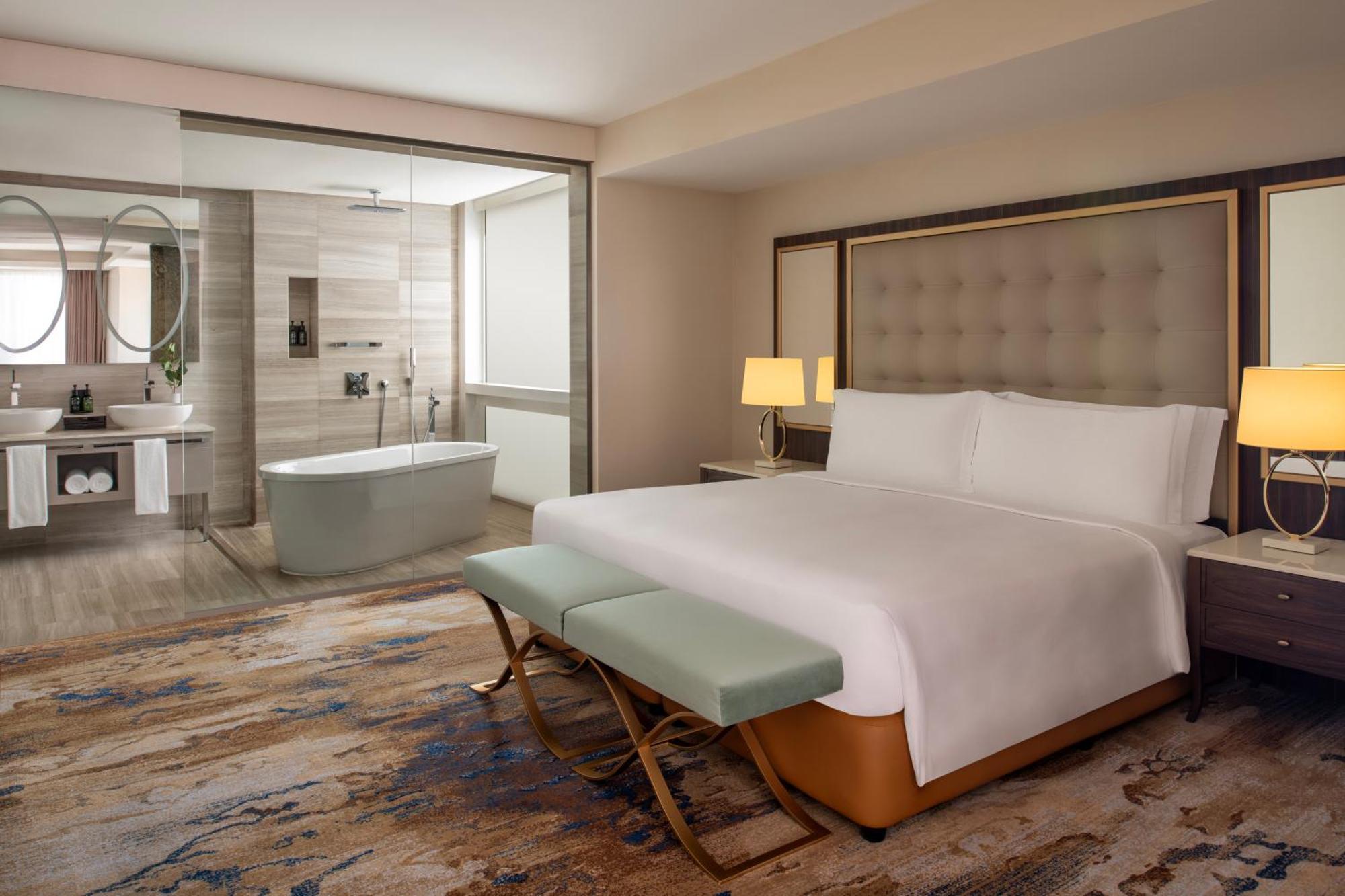 Dusit Doha Hotel Esterno foto A bedroom at the hotel