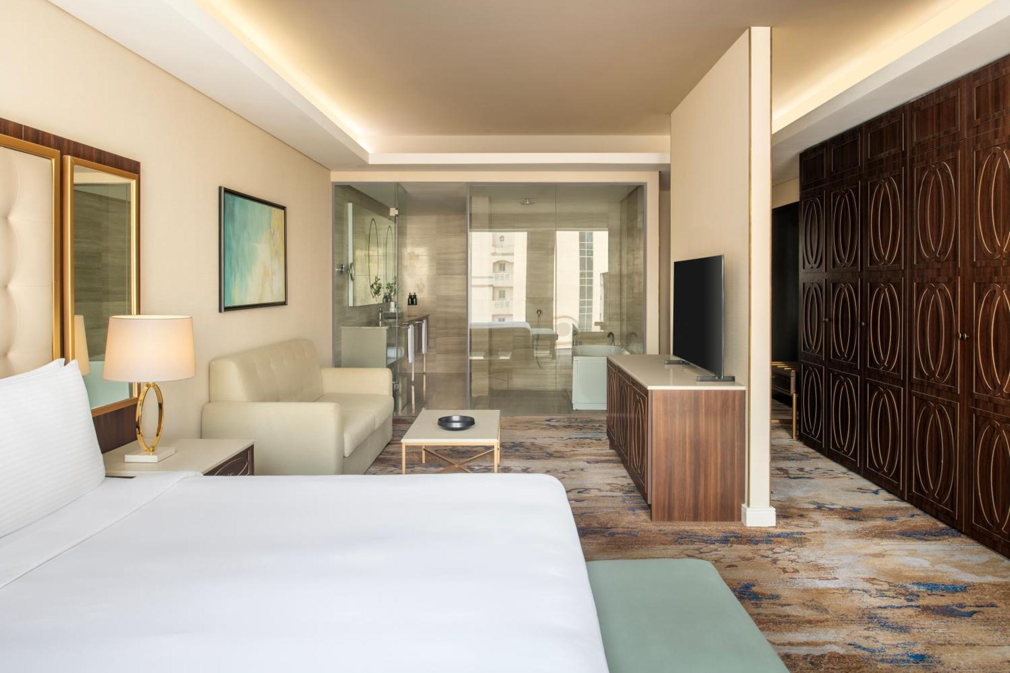 Dusit Doha Hotel Esterno foto A guest room at the hotel